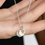 Silver Waved Disc Imprint Pendant